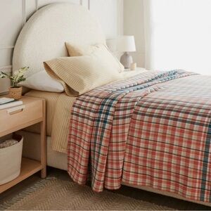 Threshold Plaid Quilt with orange, teal, and cream